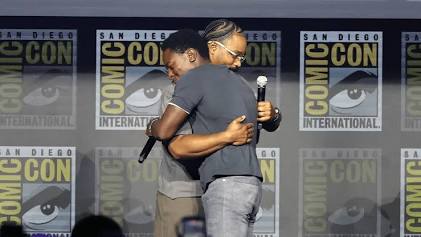 Ryan Coogler embracing David Jonsson on stage