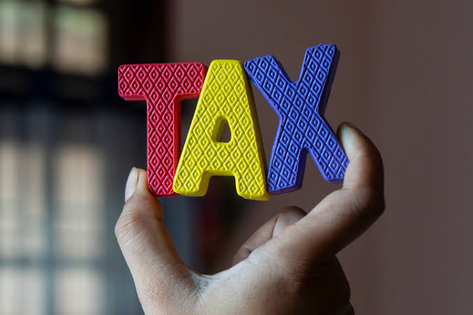 Taxpayer Reviewing AIS and Form 26AS on Laptop