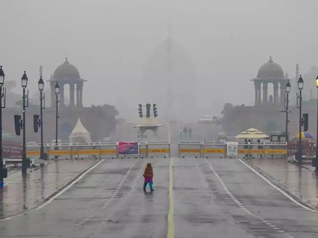 Rain and mist along Kartavya Path India Gate in New Delhi during monsoon