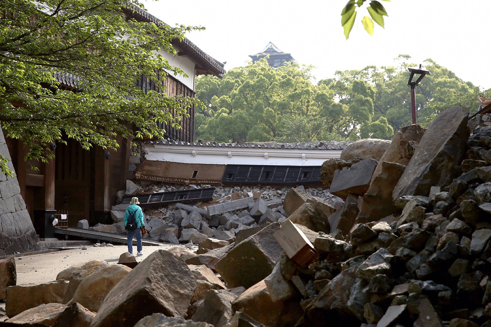 Historical stone moat walls at Kumamoto Castle damaged during earthquake ground shaking