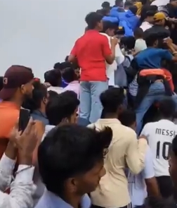 image of Massive Crowd Jams Narrow Steps at Harihar Fort