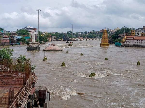 Raging floodwaters of Godavari River inundating Ramkund and Panchavati ghats in Nashik