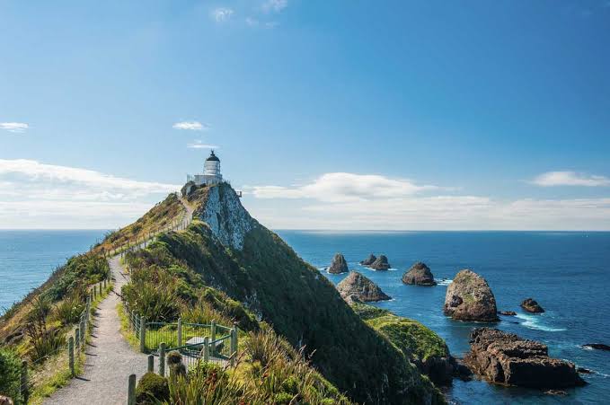 Scenic coastal view of Nugget Point Lighthouse near Dunedin Otago New Zealand