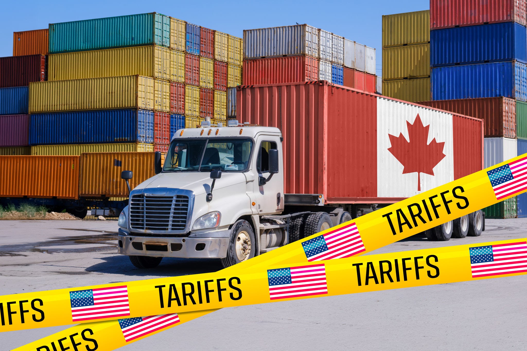 US President signing executive tariff proclamation with US and Canada flags in background