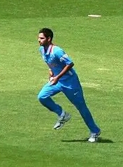 Bhuvneshwar Kumar fielding in sky blue Team India jersey