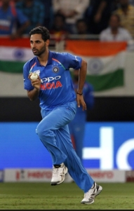Bhuvneshwar Kumar running in to bowl for Team India