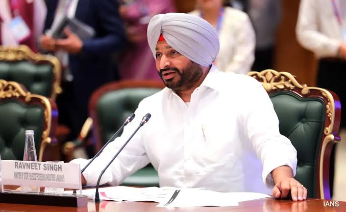 Ravneet Singh Bittu seated at an official Union Council meeting table